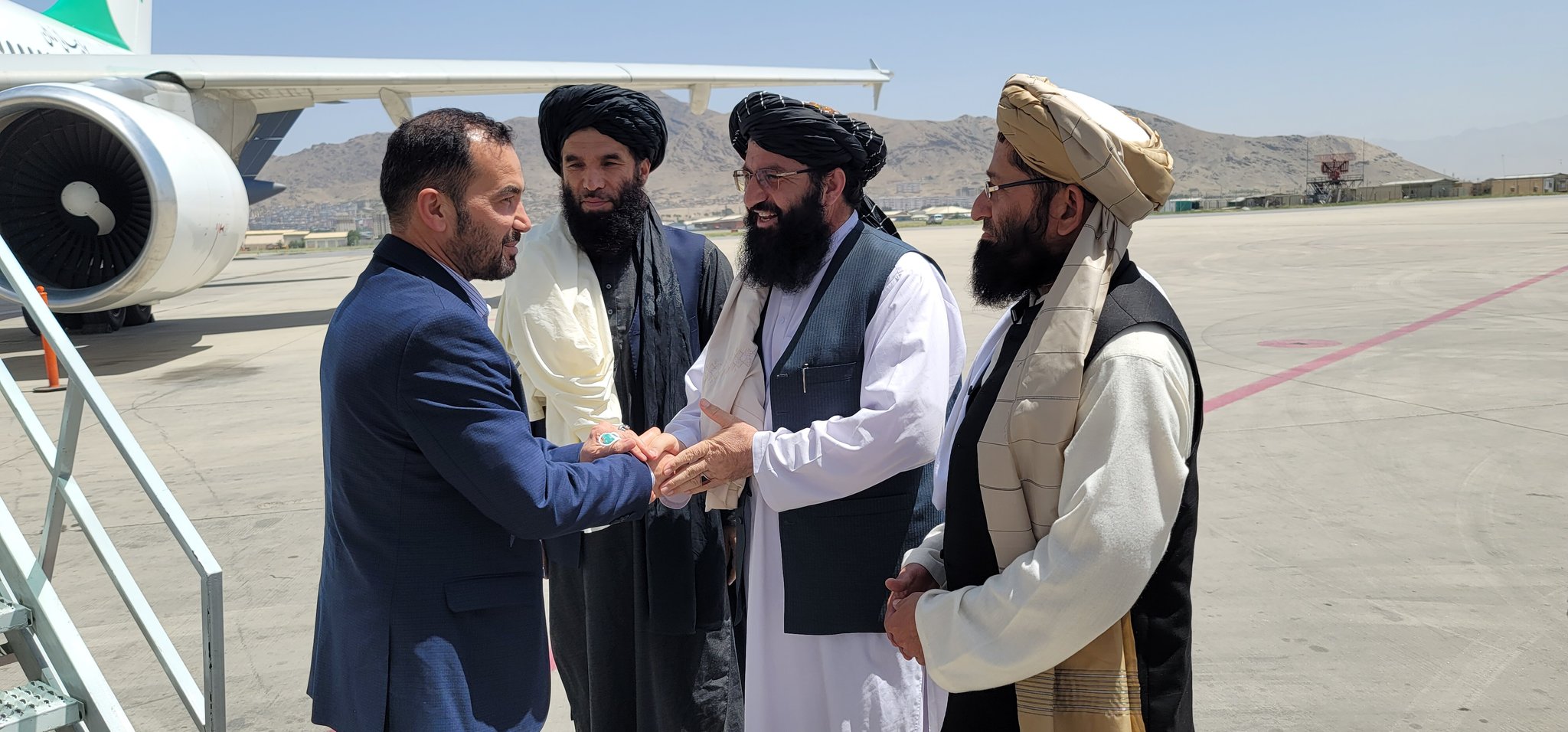 Three officials of former government return to Afghanistan